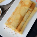 Crêpes finies empilées sur une assiette